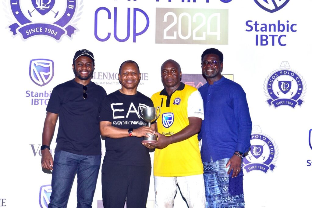 L-R: Mohammed Sani Dangote, Captain, Lagos Polo Club; Wole Adeniyi, Chief Executive, Stanbic IBTC Bank; Bode Makanjuola, President Lagos Polo Club and Muyiwa Oni, Head Equity Research, West Africa, Standard Bank and Immediate Past Captain, Lagos Polo Club at the finals of the 2024 Lagos Polo Captain's Cup, sponsored by Stanbic IBTC’s Corporate and Investment Bank.